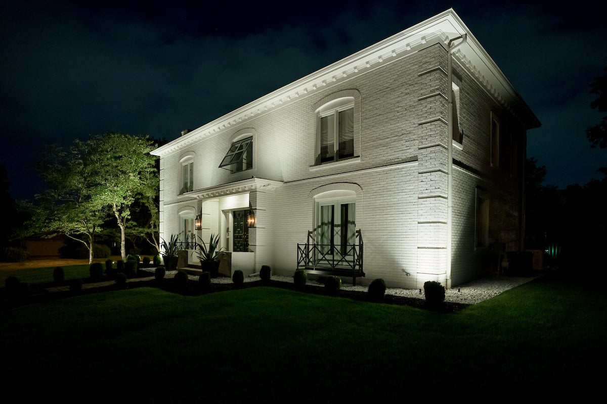 White brick house at night
